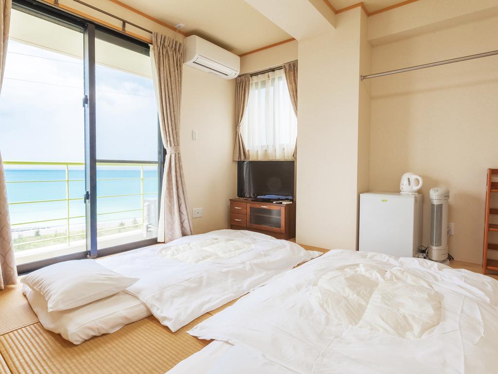 Kariyushi Condominium Ocean Hills Chouraku Stay Кин Экстерьер фото